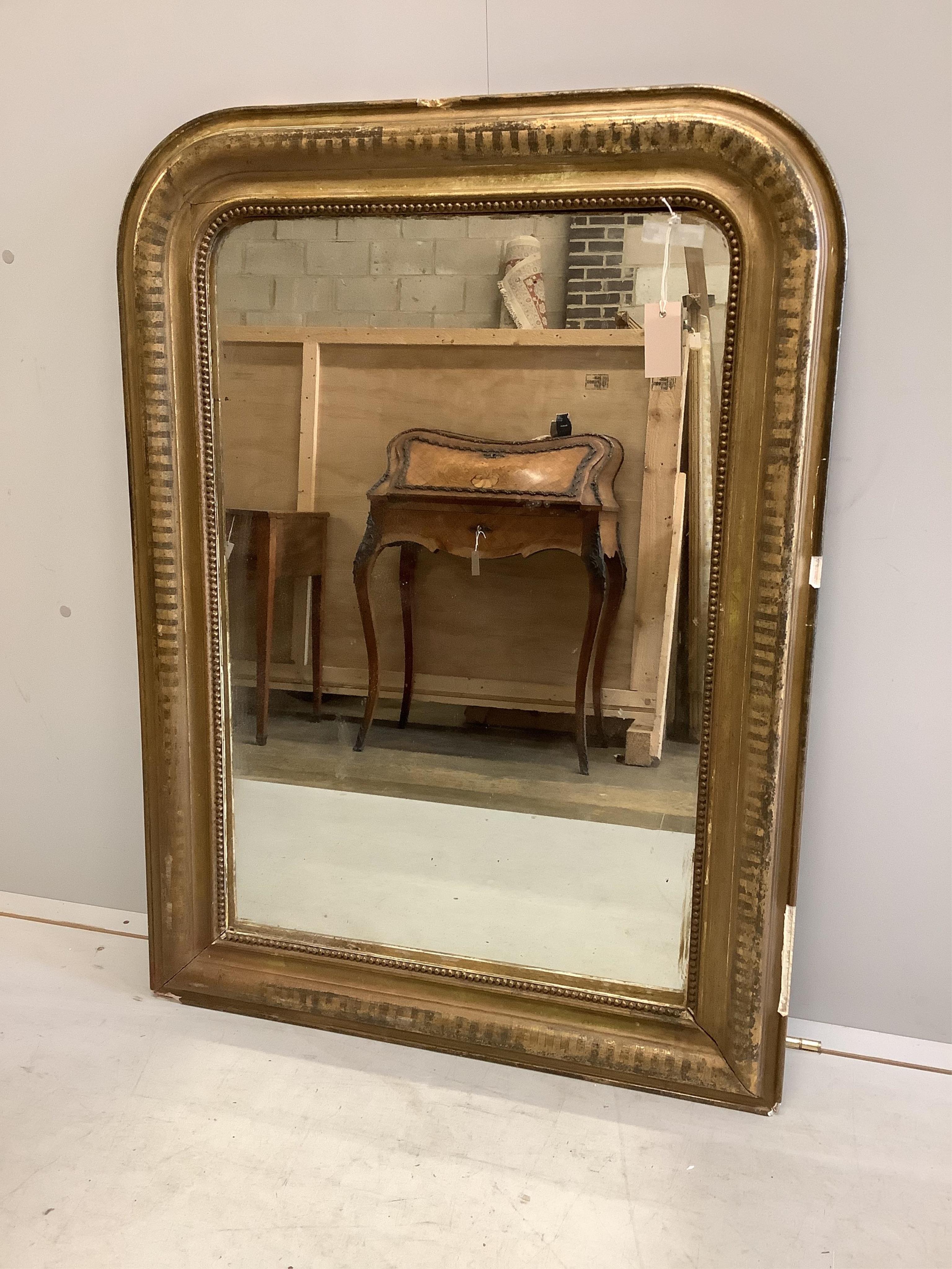 A 19th century French giltwood and composition overmantel mirror, width 76cm, height 105cm. Condition - fair